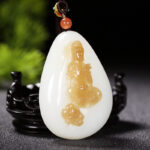 和田玉糖羊脂白玉观音挂件66.49g Hetian Jade Sugar White Jade Guanyin Pendant 66.49g